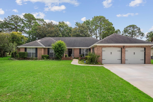 ranch-style home featuring a garage and a front lawn