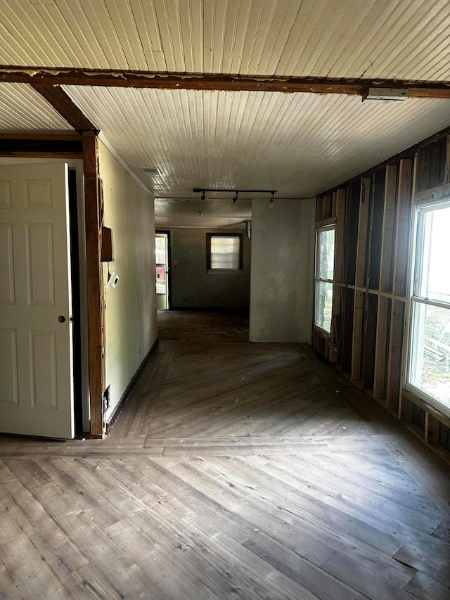 interior space featuring wood ceiling, hardwood / wood-style floors, and wood walls