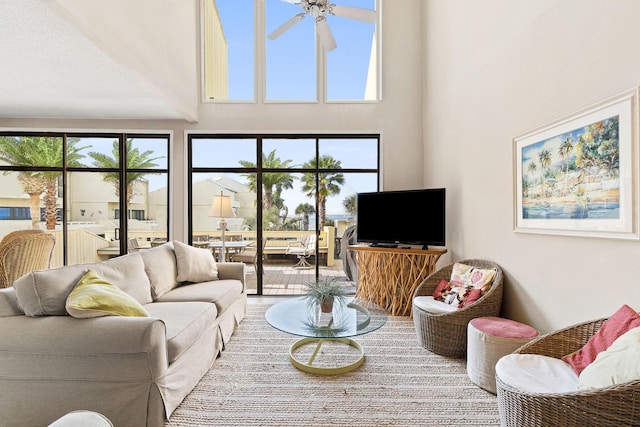 living room with ceiling fan