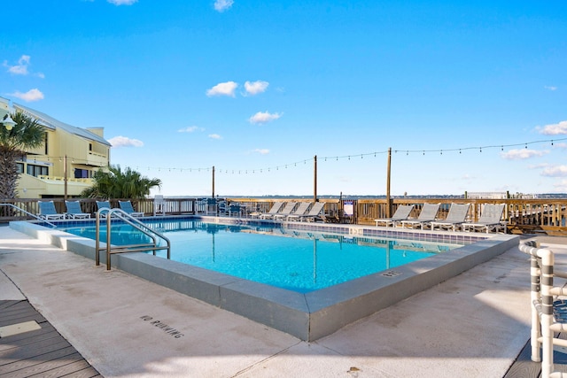 view of pool featuring a patio