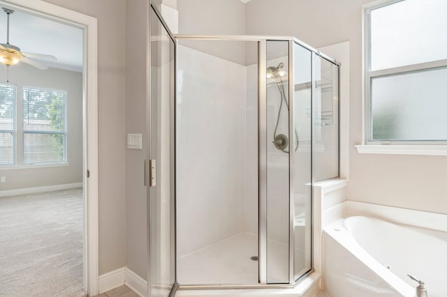 bathroom with shower with separate bathtub, ceiling fan, and crown molding