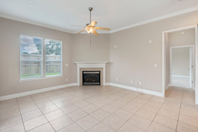 unfurnished living room featuring light tile patterned flooring, a fireplace, ornamental molding, and ceiling fan