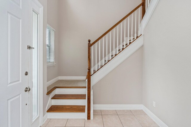 interior space featuring light tile patterned floors