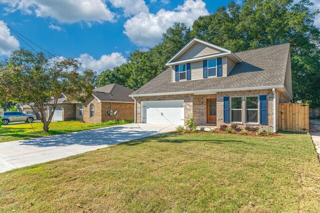 view of front of house with driveway, a garage, brick siding, fence, and a front yard