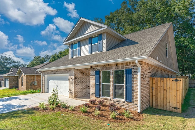 view of front facade featuring a garage and a front yard