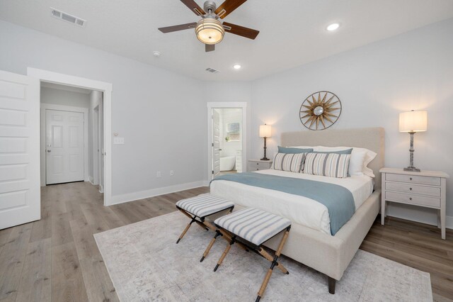 bedroom with recessed lighting, visible vents, light wood-style flooring, and baseboards