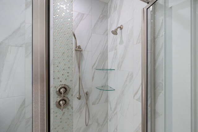 bathroom with a stall shower