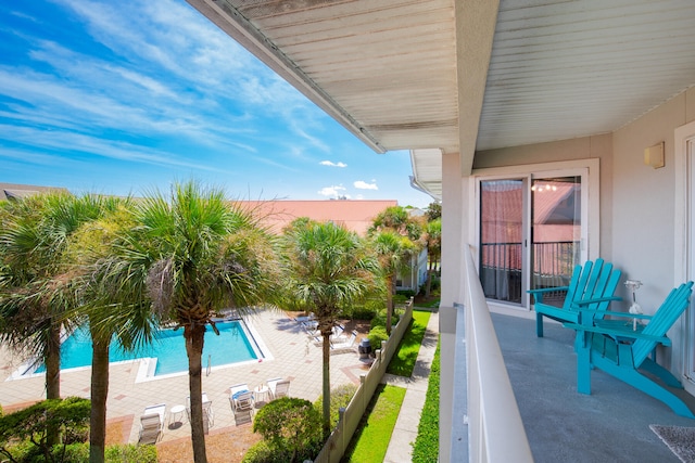 view of swimming pool featuring a patio