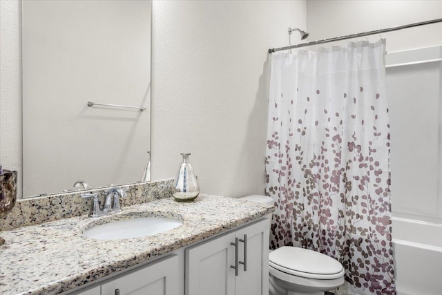 full bathroom with toilet, shower / bath combination with curtain, and vanity