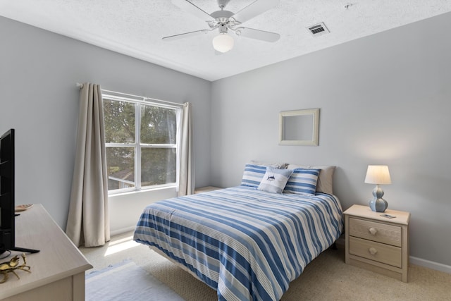 34 Herons Watch Way Unit 2202, Santa Rosa Beach, FL 32459 - carpeted bedroom with ceiling fan and a textured ceiling
