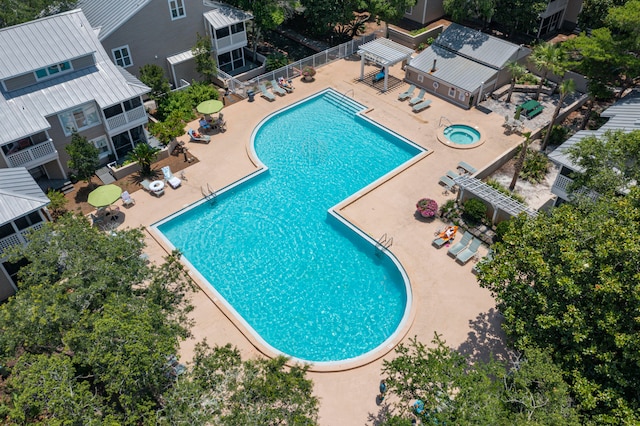 view of swimming pool with a patio