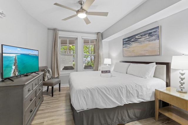 bedroom featuring ceiling fan and light hardwood / wood-style flooring