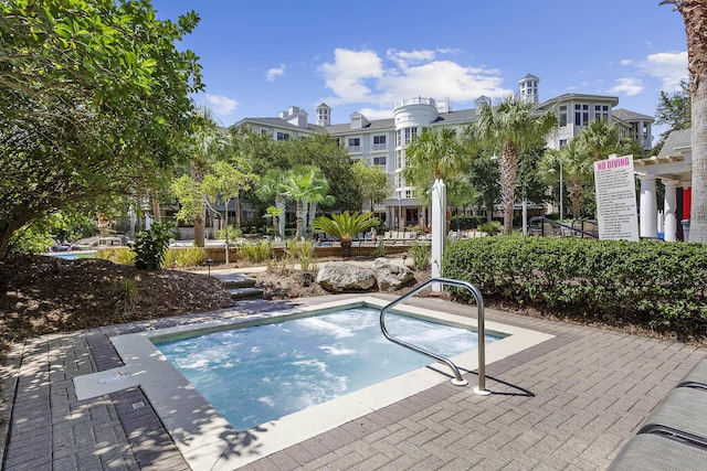 view of swimming pool featuring a patio