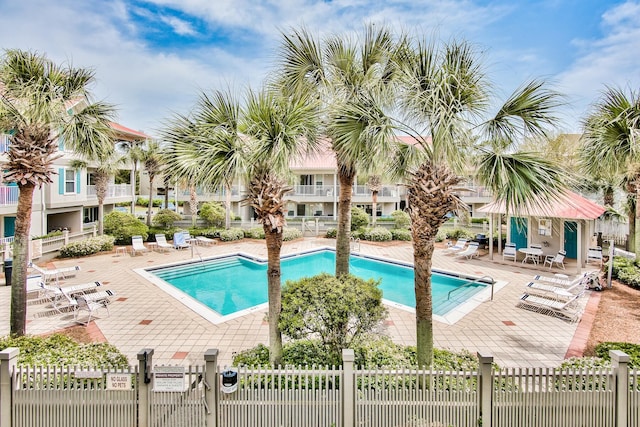 view of swimming pool with a patio area