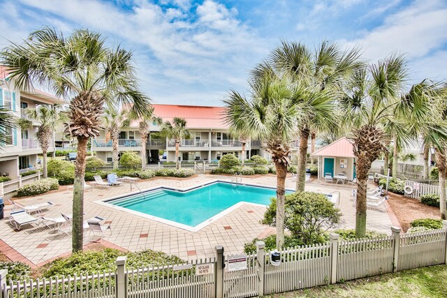 view of swimming pool featuring a patio