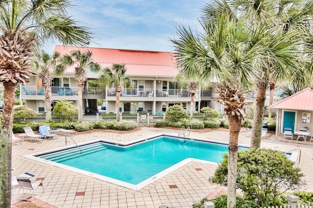 view of pool featuring a patio