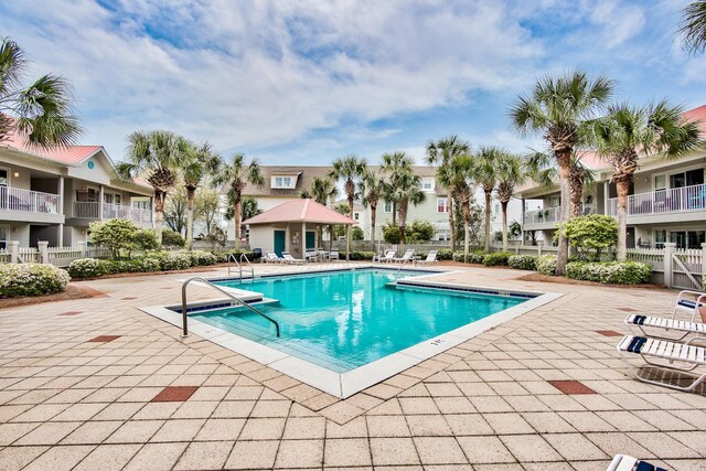 view of pool featuring a patio area