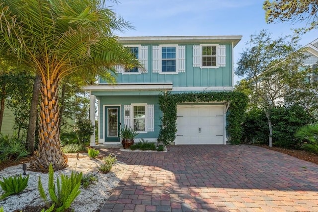 view of front of home with a garage