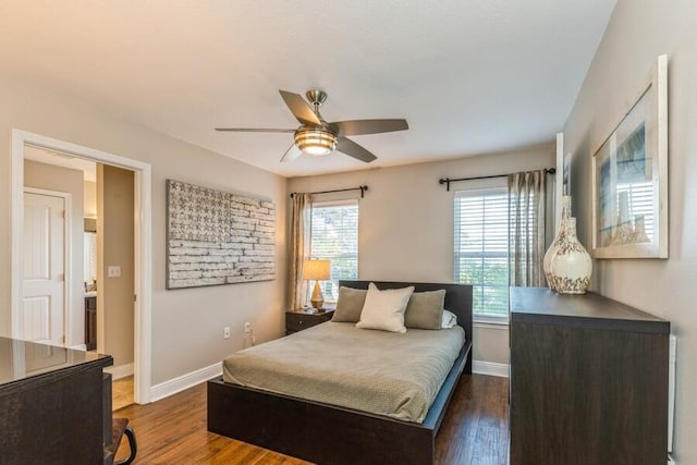 bedroom featuring ceiling fan and dark hardwood / wood-style flooring