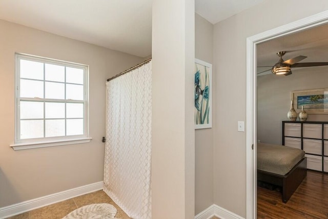 interior space featuring hardwood / wood-style flooring and ceiling fan