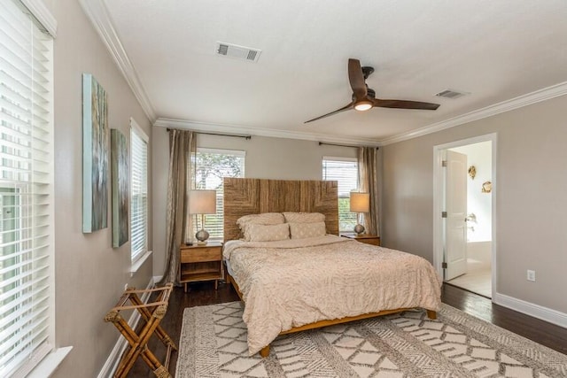 bedroom with ornamental molding, dark hardwood / wood-style flooring, connected bathroom, and ceiling fan