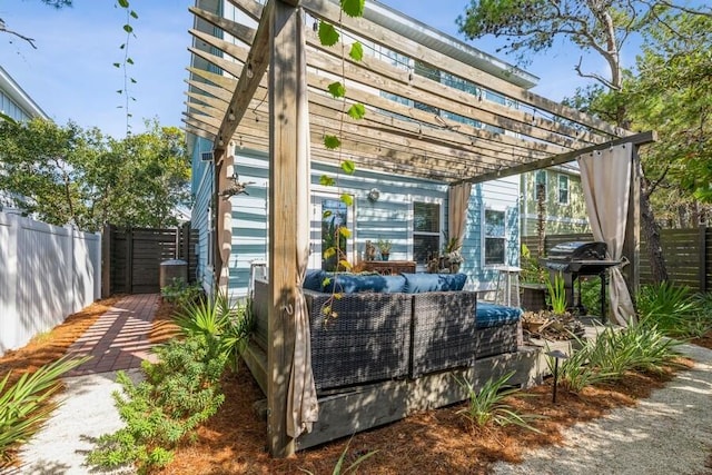 view of patio / terrace featuring a pergola and an outdoor living space