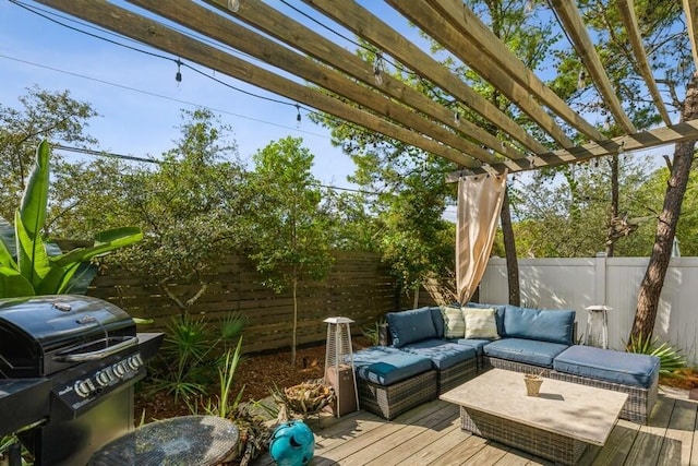 deck with a pergola, area for grilling, and an outdoor hangout area