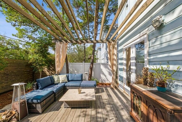 wooden terrace featuring outdoor lounge area and a pergola