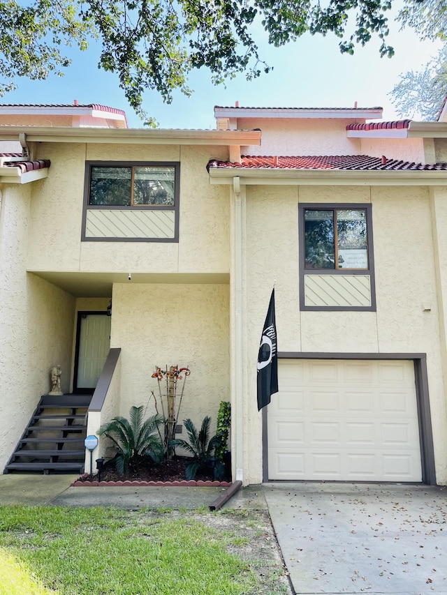 view of front of property featuring a garage