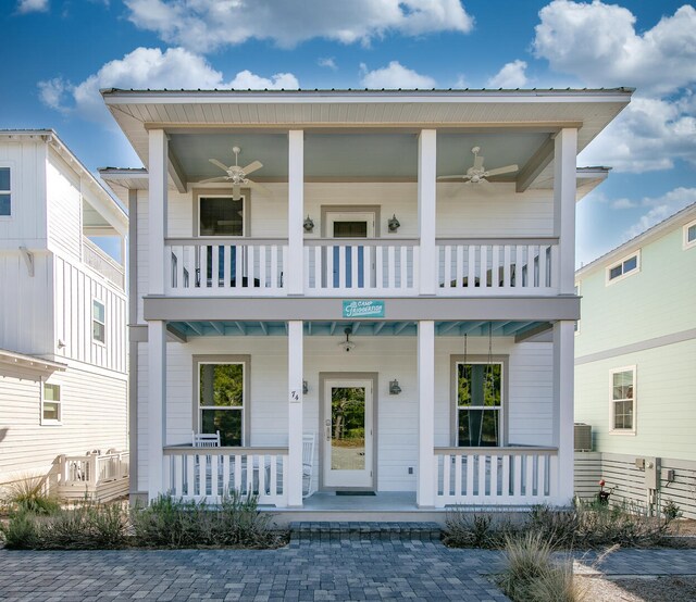 view of front of home featuring a porch, a balcony, and ceiling fan