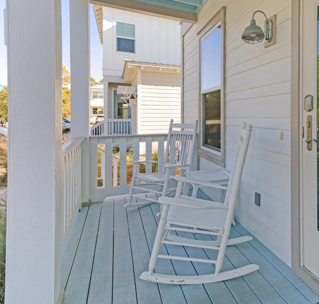 wooden deck featuring a porch