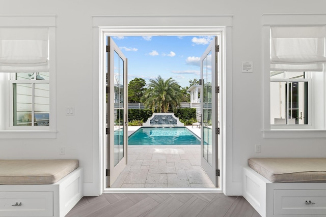 doorway featuring light parquet flooring