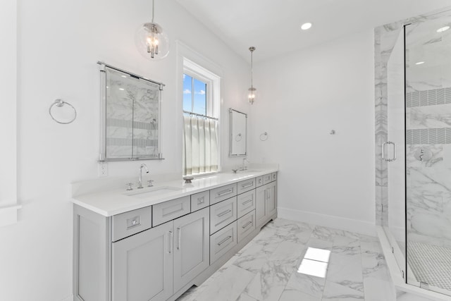 bathroom with a shower with shower door, tile patterned flooring, and dual bowl vanity