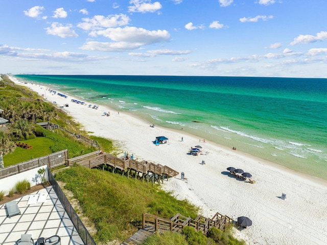 drone / aerial view with a view of the beach and a water view