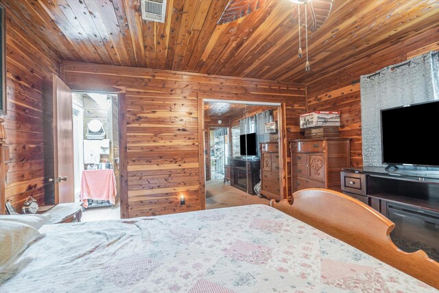 unfurnished bedroom with wood ceiling and wood walls