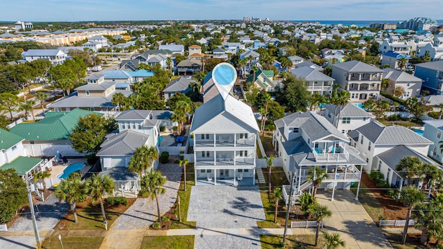 birds eye view of property with a residential view