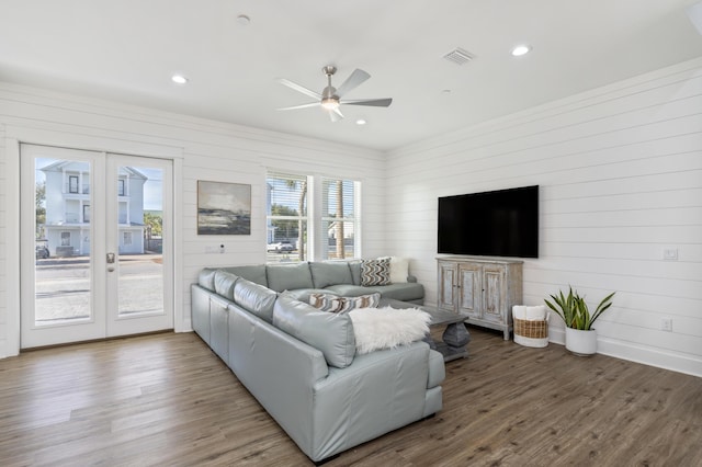 living room featuring dark wood-style floors, recessed lighting, visible vents, and a ceiling fan