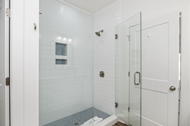 bathroom featuring a stall shower