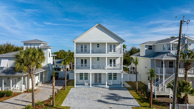 view of front of home with a balcony and a porch