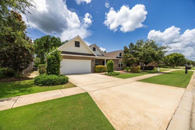 craftsman-style home with a front yard and a garage