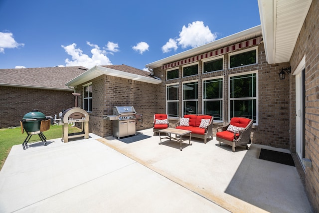 view of patio featuring grilling area and outdoor lounge area