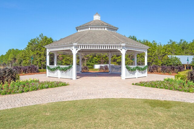 surrounding community featuring a yard and a gazebo