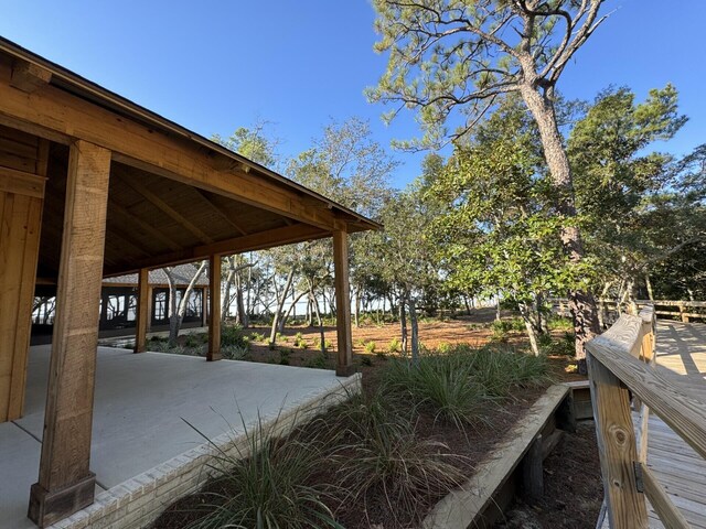 surrounding community with a patio