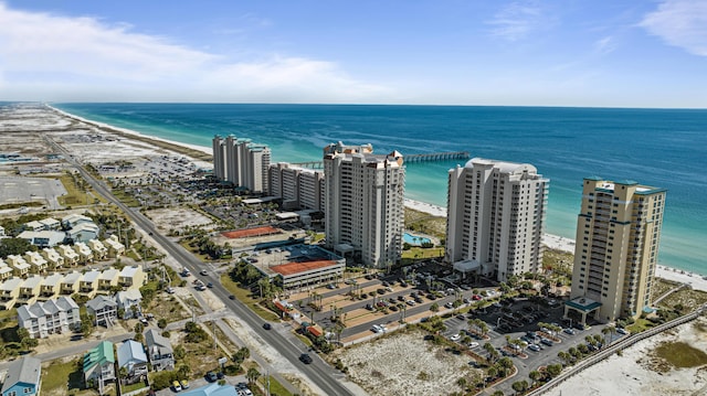 bird's eye view featuring a beach view and a water view