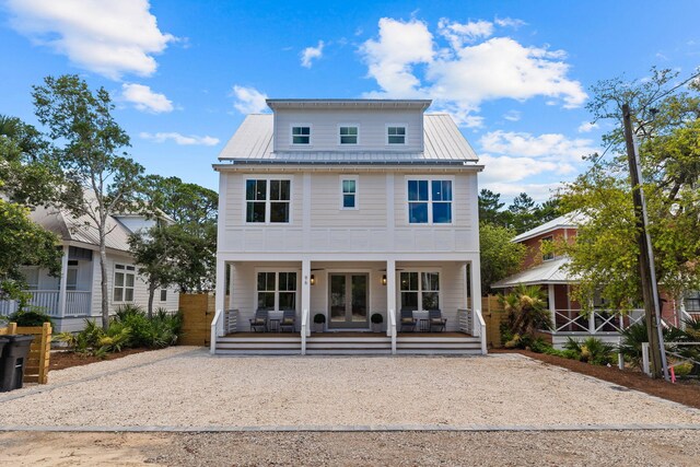 back of house featuring covered porch