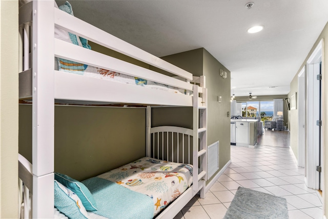 bedroom featuring visible vents and light tile patterned flooring