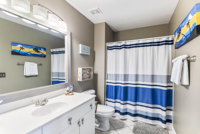 bathroom with toilet, tile patterned floors, vanity, visible vents, and a shower with curtain