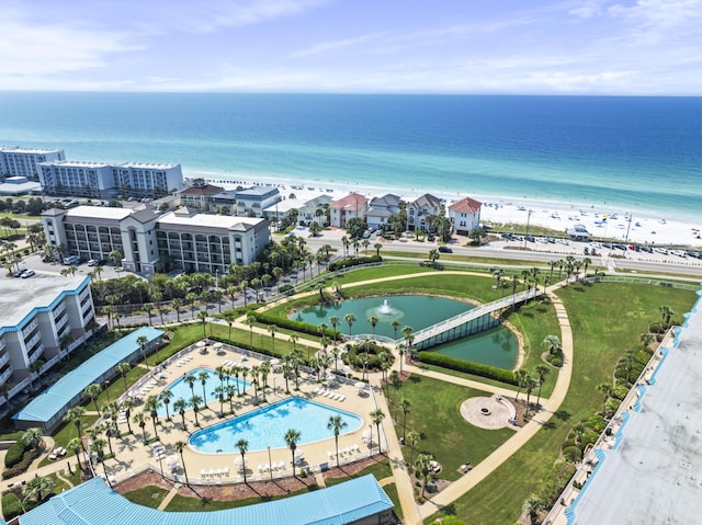 aerial view with a beach view and a water view