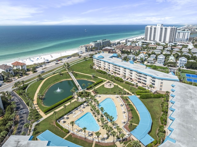 aerial view featuring a water view and a view of the beach