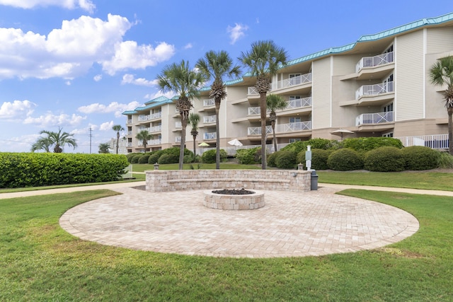 view of building exterior featuring a fire pit